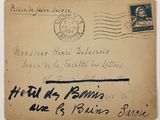 an old postcard with a handwritten message on it