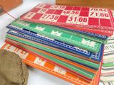 a lot of different colored cards sitting on a table