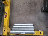 a fork lifter that is sitting on the ground