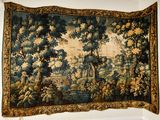 a tapestry hanging on a wall in a room