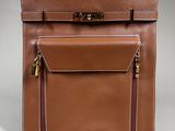 a brown leather briefcase with two zippers and a gold clasp