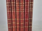 a set of five red books sitting on top of each other