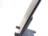a close up of a cell phone on a stand