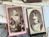 many old photos of men and women on a table