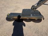 a machine that is sitting on the ground in the dirt