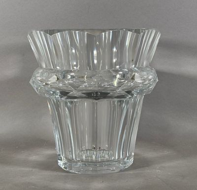 a glass vase that is sitting on a table