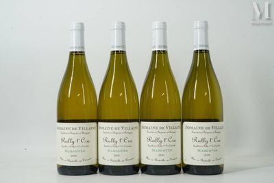 three bottles of white wine are lined up on a table