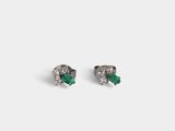 a pair of emerald and diamond earrings on a white background