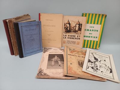 several books are stacked on top of each other on a table