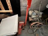 a picture of a room with a lot of stuff on the floor