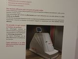 the box is open to show the instructions for the machine