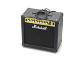 a close up of a black and yellow guitar amplifier on a white surface