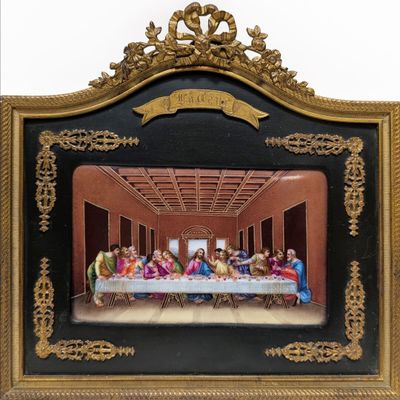 tableau représentant la Cène de Jésus, dans un cadre doré