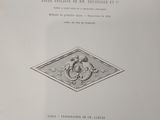 an old book with a picture of a dragon on it