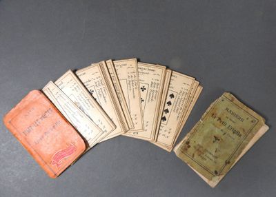 several old books sitting on top of a table next to each other