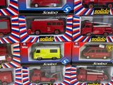 a lot of red and yellow toy cars in the package