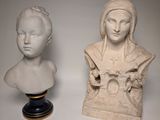 pair of marble busts of a woman and a man