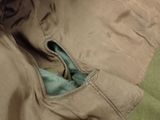 a close up of a jacket with a zipper on it