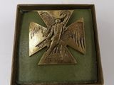 an image of a box with a cross and a bird on it