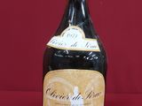 a bottle of wine that is sitting on a table