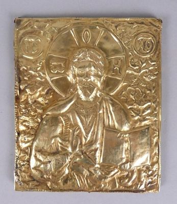 une image représentant une assiette en or sur laquelle figure Jésus