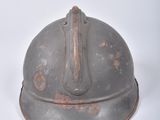 a helmet that is sitting on a white surface