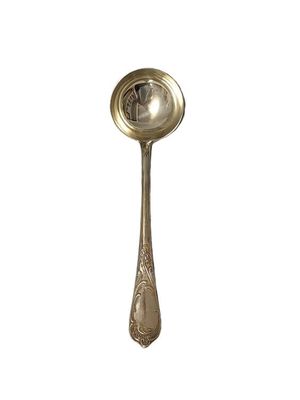 a silver spoon with a handle on a white background