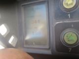 a close up of a person ' s finger on a control panel