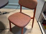 a chair that is sitting in front of a table