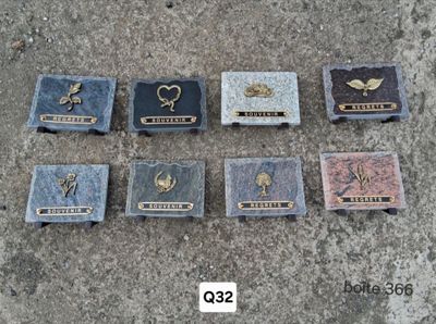 a group of plaques that are on the ground