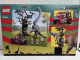 a box of legos with a picture of a dinosaur and a car
