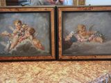 two framed pictures of cherensils on a table