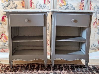 two nightstands that have been painted gray and are next to each other
