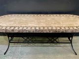 a table that has a tile top on it