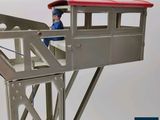 a toy train that is sitting on top of a platform