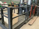 a picture of a forklift with a box in it