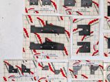 many pieces of paper that have been cut into squares