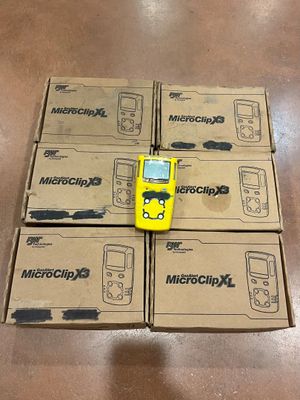 four boxes of electronic devices are stacked on top of each other