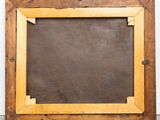 an old wooden frame with a blackboard in the middle