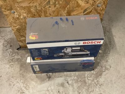 boxed box of a model train on the ground in a room