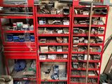 a garage with a lot of tools on the shelves