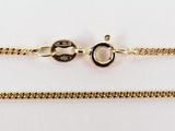 a pair of gold chains on a white background