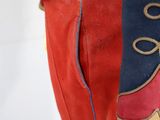 a close up of a red and blue uniform on a mannequin