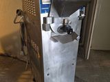 a machine that is sitting on the floor in a room