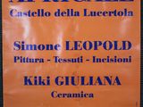 a sign on the wall that says apricale casteello del lucertola