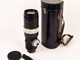 a black camera with a black case and a black camera lens