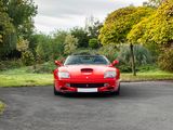 a red sports car that is parked in the driveway