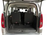 two seats in the back of a van with the door open