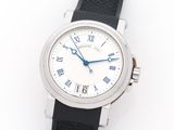 a close up of a watch on a white surface with a black strap