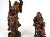 paire de figurines chinoises en bois sculpté représentant un homme et une femme